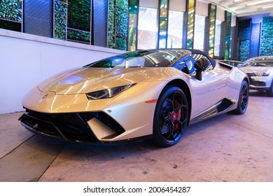 Palm Beach, Florida USA - March 22, 2021: Gold Lamborghini Aventador. Corner View.