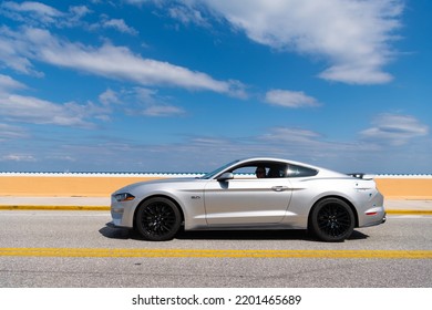 Palm Beach, Florida USA - March 21, 2021: Ford Mustang Car On Road In Palm Beach. Side View