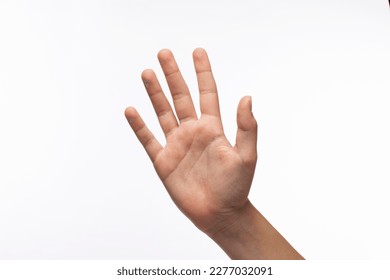 Palm hand gesture isolated on white background, boy hand saying hello or goodbye