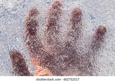 Palm Of A Man Under Ice