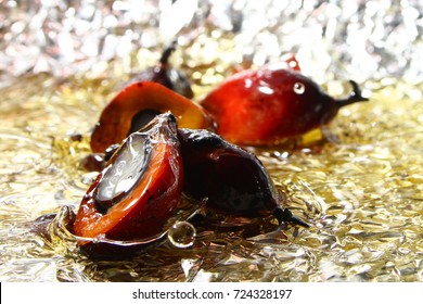Palm oil background / Palm oil is an edible vegetable oil derived from the reddish pulp of the fruit of the oil palms
