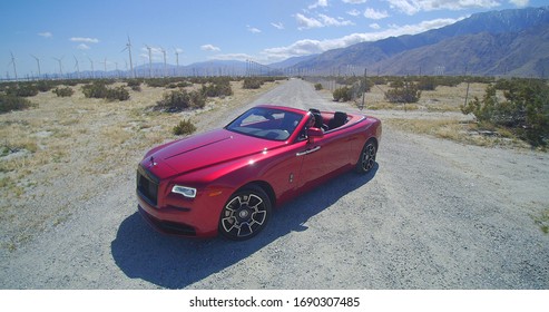 Palm Springs, CA - March 30, 2020: The 2020 Rolls-Royce Dawn Black Badge, Shown In Magma Red.