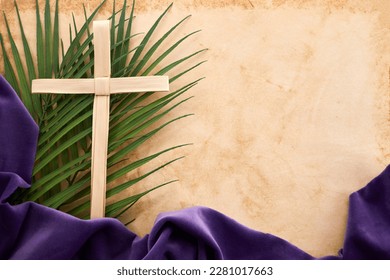 Palm sunday background. Cross and palm on vintage background.