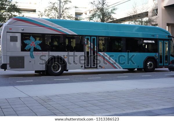Palm Tran Bus travels in the heart of\
downtown West Palm Beach, Florida on Feb 11,\
2019