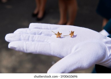 A Palm In A White Glove With Stars For Epaulets (students After Graduation From A Military Academy)