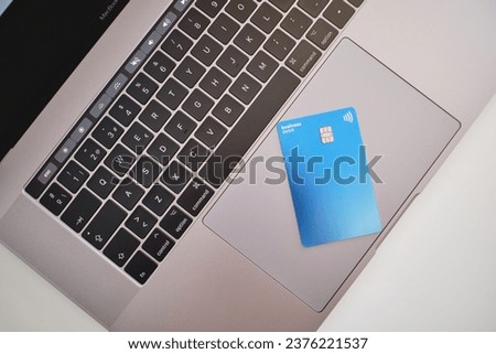 Palma, baleares, spain, november 20, 2020: paypal card on top of an appel computer