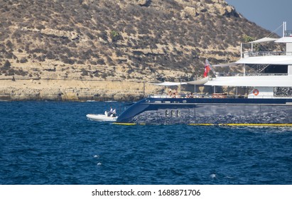 PALMA DE MALLORCA, BALEARIC ISLANDS, SPAIN - AUGUST, 2019: Luxury Yacht Symphony Owned By Bernard Arnault. Passengers Spend Time On The Deck Of The Yacht.