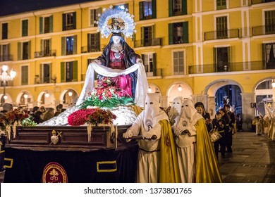 Palma De Mallorca / Spain - April 18 2019. EASTER WEEK IN SPAIN.  Semana Santa. Festival Religious Brotherhoods. Virgin Mary Statue Parade Through The Narrow Streets. 