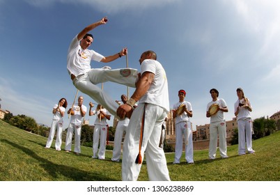 Palma de Mallorca / Spain - May 14, 2012: Capoeira dancers perform on a public park in the Spanish island of Mallorca