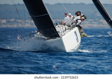 Palma de Mallorca, Spain - May 7, 2022: The ORC 5 Immac Fram crew competing during the Palma Vela regatta, hosted by the Real Club Náutico of Palma.