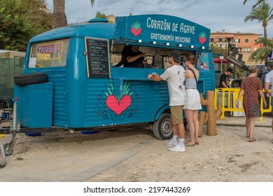 Palma De Mallorca, Spain; September 03 2022: Van Van Palma Street Food Festival At Sunset. Island Of Mallorca, Spain. Van Selling Street Food