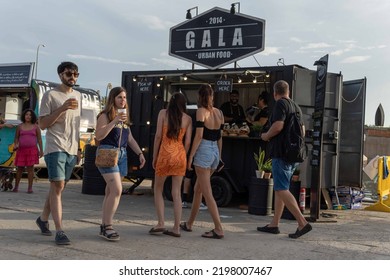 Palma De Mallorca, Spain; September 03 2022: Van Van Palma Street Food Festival At Sunset. Island Of Mallorca, Spain. Van Selling Street Food