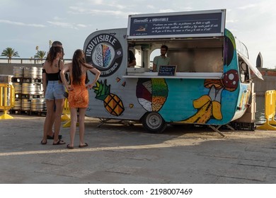 Palma De Mallorca, Spain; September 03 2022: Van Van Palma Street Food Festival At Sunset. Island Of Mallorca, Spain. Van Selling Street Food