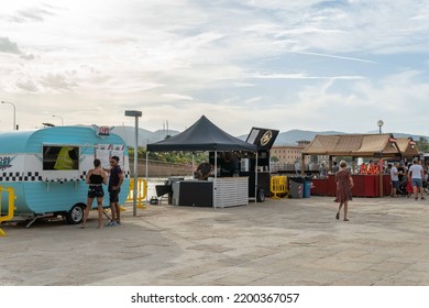 Palma De Mallorca, Spain; September 03 2022: Van Van Palma Street Food Festival At Sunset. Island Of Mallorca, Spain. Van Selling Street Food