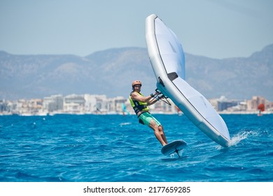 Palma de Mallorca,Spain - July 9, 2022: Gunner Marc Biniasch (GER) winner  of the  Balearia Wing Foil Spain Series during the competition hosted by Club Náutico del Arenal