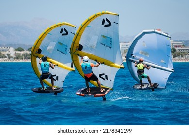 Palma de Mallorca,Spain - July 9, 2022:  Riders grouped together during one of the outings in the Balearia Wing Foil Spain Series hosted by Club Náutico del Arenal