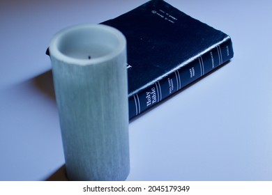 Palmdale, California  United States - September 20th 2021: Dark Toned Bible With Candle