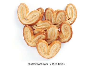 Palmier puff pastry cookies on a white background, top view - Powered by Shutterstock