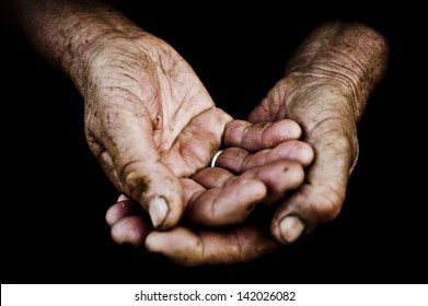  Palms Of  Old Man On A Black Background.