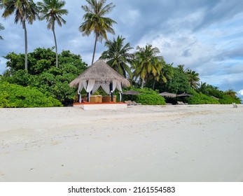 Palms On The Beach Near The Ocean, Maldives Paradise, Wooden Place For Spa Massage On The Beach	