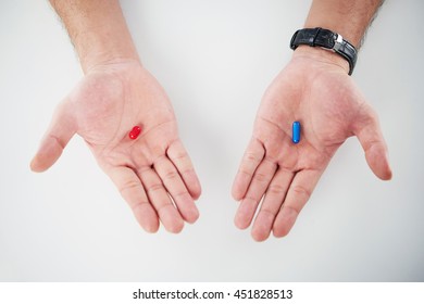 Palms With Red And Blue Pill, View From Above