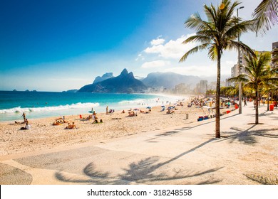 Palms and Two Brothers Mountain on Ipanema beach in Rio de Janeiro. Brazil. - Shutterstock ID 318248558