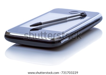 Palmtop (personal organizer) and stylus. Isolated on white background. General not branded appearance