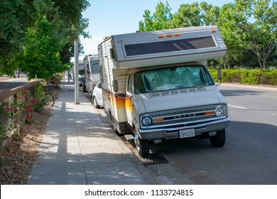 Palo Alto, California, United States - July 12, 2018: Run-down RV And Trailer Parked Along Public Street. Streets Have Become Home For Homeless In California And USA