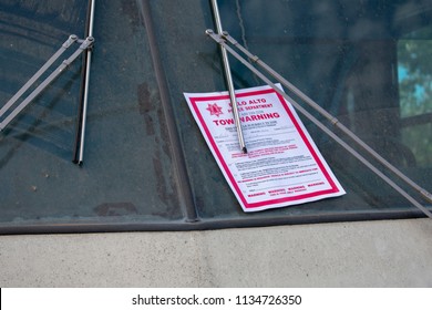 Palo Alto, California, United States - July 12, 2018: Palo Alto Police Department Placed The Tow Warning Flyer Under The Windshield Wiper Of RV Parked A Long-term Along El Camino Real.