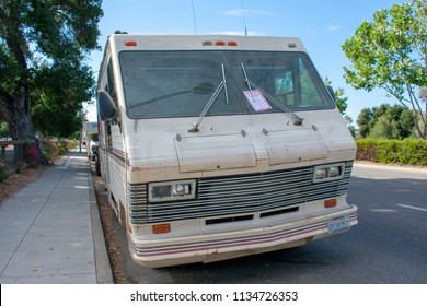 Palo Alto, California, United States - July 12, 2018: Palo Alto Police Department Placed The Tow Warning Flyer Under The Windshield Wiper Of RV Parked A Long-term Along El Camino Real.