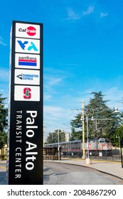 Palo Alto Transit Center Signpost With Names Of Public Transportation Transit Services - SamTrans, Caltrain, VTA, Dumbarton Express - Palo Alto, California, USA - 2021