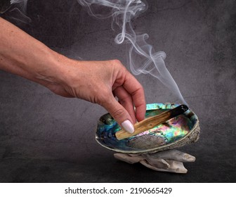 Palo Santo Burning In Front Of White Background