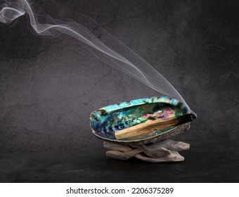 Palo Santo Burning In Front Of White Background