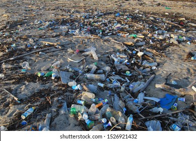 palopo, Indonesia, 10-10-2019: Beach pollution, plastic and waste from ocean on the beach