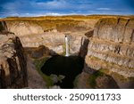 The Palouse Falls.  It lies on the Palouse River, about 4 mi upstream of the confluence with the Snake River in southeast Washington