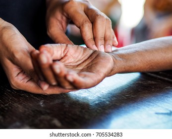 Palpation Pulse Rate On The Wrist By Fingers.