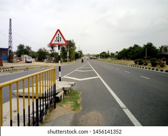 Palsana,Rajasthan/India-July 16, 2019: Two Roads Converge And Merging Sign. Left Lane Ends And Merge In National Highway 52.