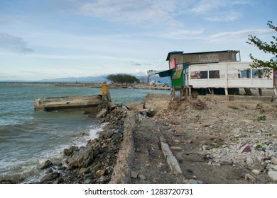 Palu, Indonesia - December 18, 2018.
Tsunami In Palu Caused By Underwater Landslide Made Coastline Narrow And Damaging More House Near Coastline On High Tide