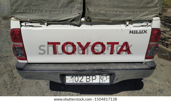 Pamir highway,\
Afghanistan, circa august 2019: Toyota Hilux army car parked in\
Pamir highway, Tajikistan