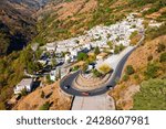 Pampaneira village aerial panoramic view. Pampaneira is a village in the Alpujarras area in the province of Granada in Andalusia, Spain.