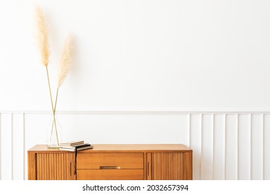 Pampas Grass In A Vase On A Wooden Sideboard Table