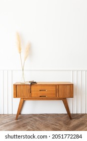 Pampas Grass In A Vase On A Wooden Sideboard Table