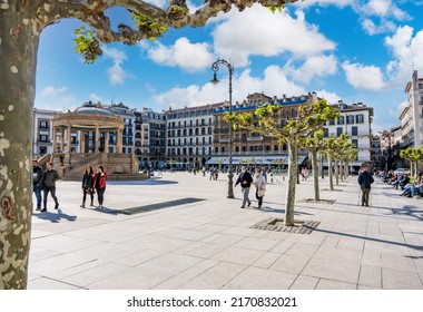 Pamplona, Spain - May 6th 2022 - Tourists passing on the Castillo square (Placa de Castillo) in Pamplona