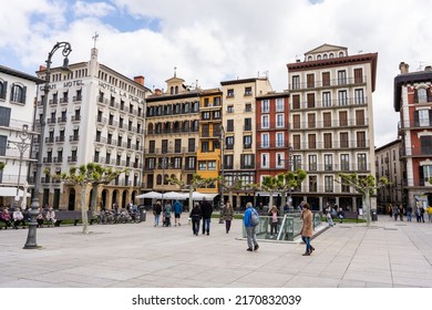 Pamplona, Spain - May 6th 2022 - Tourists passing on the Castillo square (Placa de Castillo) in Pamplona