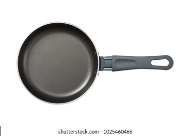 Pan. The black. Kitchen accessories. Tools for cooking. A spoon. Isolated on white background. For your design. .