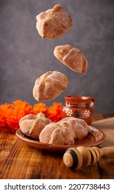 Pan de Muerto. Typical Mexican sweet bread that is consumed in the season of the day of the dead. It is a main element in the altars and offerings in the festivity of the day of the dead. - Shutterstock ID 2207738443