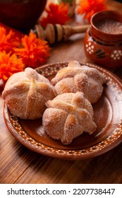Pan de Muerto. Typical Mexican sweet bread that is consumed in the season of the day of the dead. It is a main element in the altars and offerings in the festivity of the day of the dead. - Shutterstock ID 2207738447