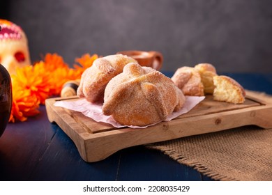 Pan de Muerto. Typical Mexican sweet bread that is consumed in the season of the day of the dead. It is a main element in the altars and offerings in the festivity of the day of the dead. - Shutterstock ID 2208035429