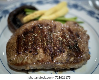 Pan Fried Steak Closeup,
Rib-eye Steak With Portobello Mushroom, Baby Corn And Asparagus Closeup With Selective Focus On Background