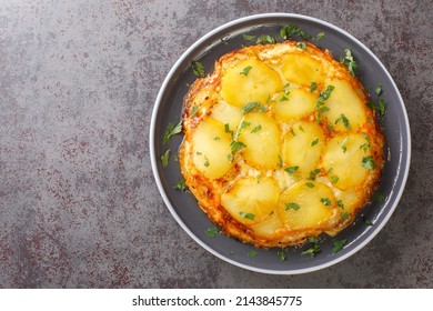 Pan Haggerty Is A Simple One Pot, Stove Top Dish Made With Potatoes, Onion And Cheese Closeup In The Plate On The Table. Horizontal Top View From Above
